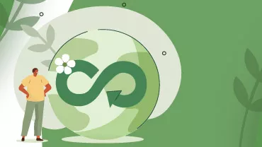 Hombre observa símbolo de sostenibilidad en una tierra verde.