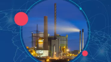 Planta industrial iluminada por la noche con fondo azul y líneas conectadas.